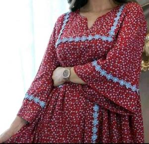 جيګري رنګه کالي چې په غاړه او لستونو سپين پرک لري